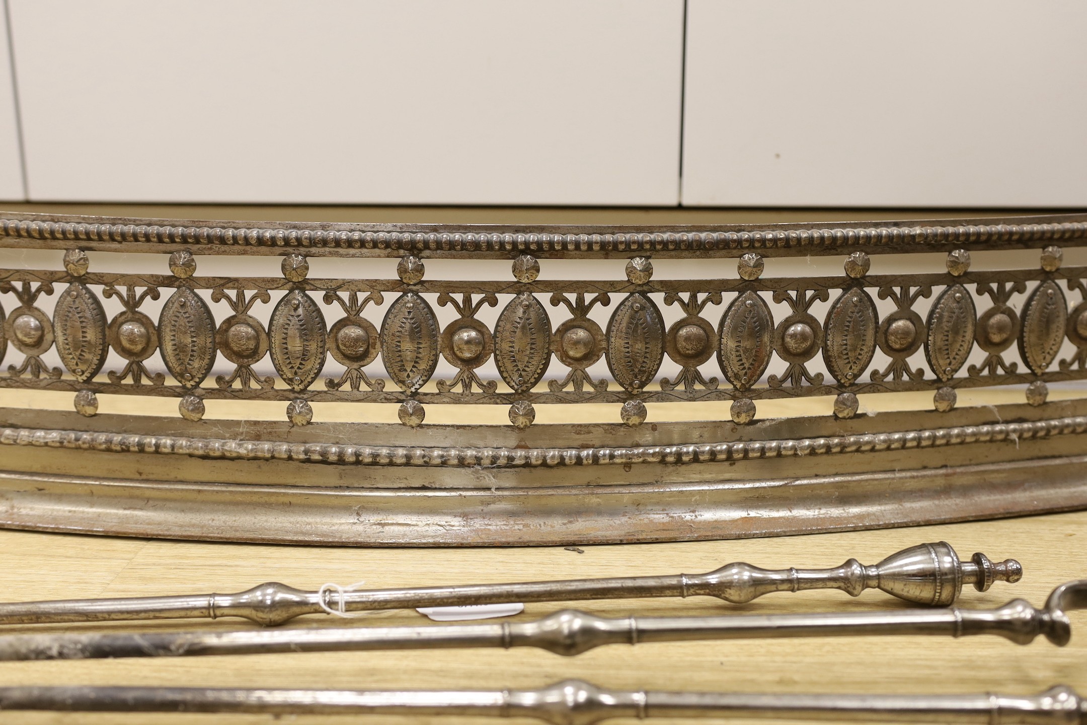 A suite of fireplace furniture comprising of a basket, fender and tools